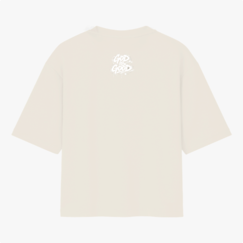 Camiseta com estampa frontal de texto 'Still Be Blessed' acompanhado de um halo, e estampa traseira de texto estilizado 'God is Good'.