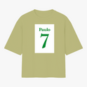 Camiseta com estampa frontal de nome "Paulo" acima do número "7", ambos em fonte estilizada, sugerindo uma temática esportiva ou personalizada.