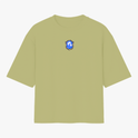 Camiseta com estampa frontal de brasão estilizado e estampa traseira de rosto tribal com "Brasil de Axé" acima e o número "777" em destaque.