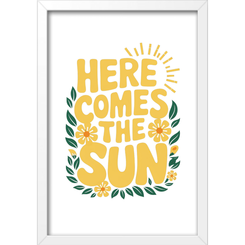 Quadro com estampa de texto “Here Comes the Sun” cercado por folhas verdes e flores amarelas, com ilustração de raios de sol na parte superior.