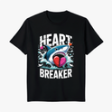 Camiseta com estampa frontal de tubarão sorridente segurando coração partido, rodeado por ondas e três corações menores, texto "Heart Breaker" ao redor.