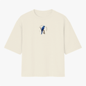 Camiseta com estampa frontal de arara azul em postura lateral com texto circular pequeno e estampa traseira de arara azul maior com texto "ZOOWEAR".