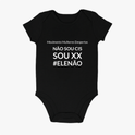 Body infantil com estampa frontal de texto "Movimento Mulheres Despertas", seguido de "NÃO SOU CIS SOU XX #ELENÃO" em destaque em fonte clara.