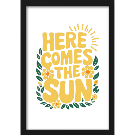 Quadro com estampa de texto “Here Comes the Sun” cercado por folhas verdes e flores amarelas, com ilustração de raios de sol na parte superior.