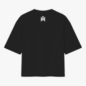 Camiseta com estampa frontal de rosto sorridente decorado com folhas e texto "Elevate Your Frequency" emoldurado por elementos naturais e estampa traseira de símbolo geométrico simples próximo à gola.
