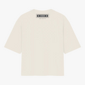 Camiseta com estampa traseira de retângulo contendo símbolos circulares nos cantos, a palavra "VOID" no centro, e abaixo "INFINITY" em fonte discreta.