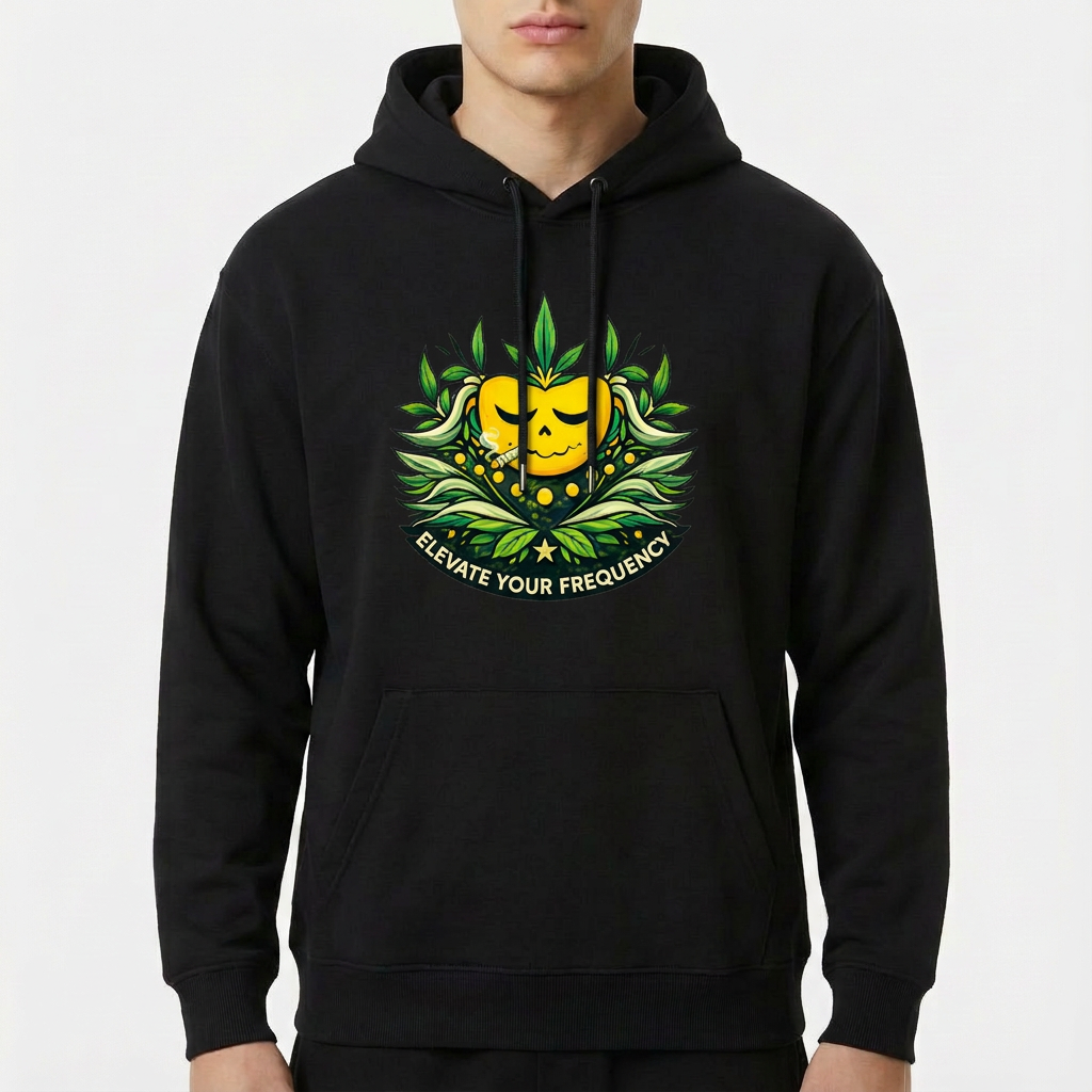 Moletom com estampa frontal de uma figura central amarela sorridente, cercada por folhas verdes e detalhes florais, com o texto "Elevate Your Frequency".