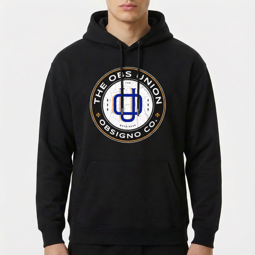 Moletom com estampa frontal de emblema redondo "THE OBS UNION" ao redor de um símbolo central estilizado e o texto "OBSIGNO CO." na parte inferior.