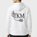 Moletom com estampa frontal de texto estilizado "GRK" com um arco e flecha e estampa traseira de "TKM" acompanhada de um ramo de folhas e flecha.