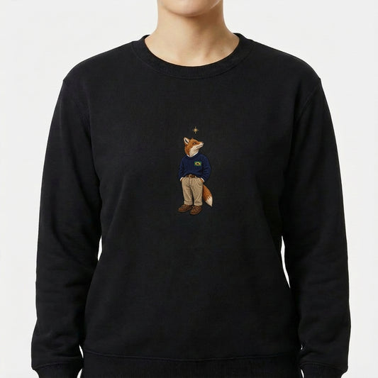 Moletom com estampa frontal de uma raposa vestida como humano, usando suéter e calças, olhando para uma estrela sobre sua cabeça.