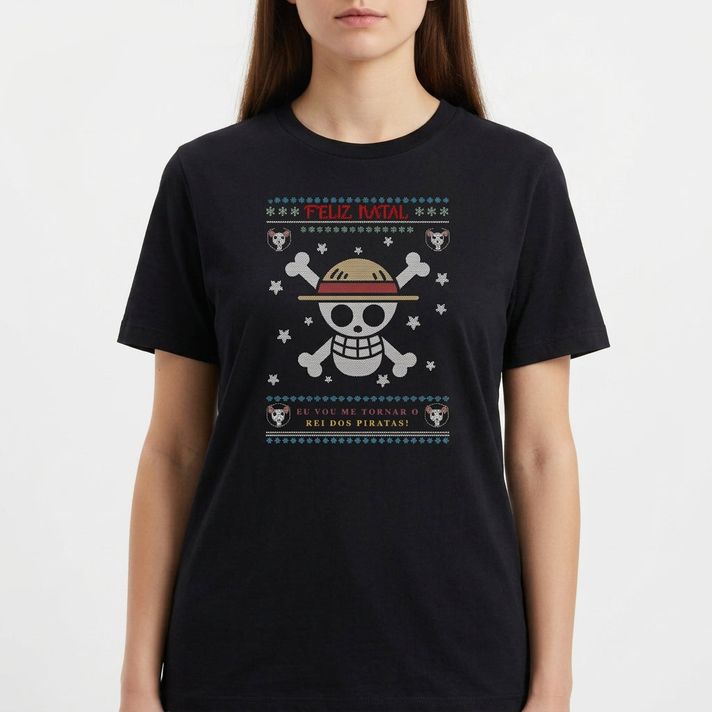 Camiseta com estampa frontal de caveira estilizada com chapéu, ossos cruzados, flocos de neve, pequenos crânios e a frase "Feliz Natal" acima.