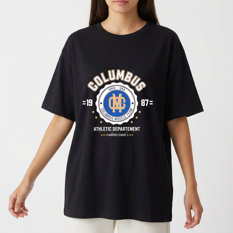 Camiseta com estampa frontal de "Columbus Ohio - USA" em estilo atlético, incluindo emblema central com "Muscle Team" cercado por estrelas e texto adicional.