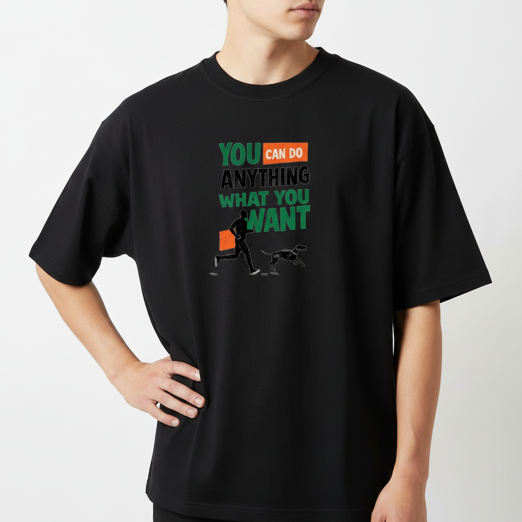 Camiseta com estampa frontal de texto estilizado "YOU CAN DO ANYTHING WHAT YOU WANT" acompanhado de uma ilustração de pessoa correndo com um cachorro.